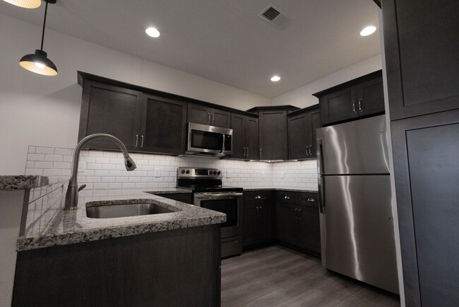 Building Photo - NEW LUXURY 2 BED 2 BATH 1 CAR GARAGE DUPLEX