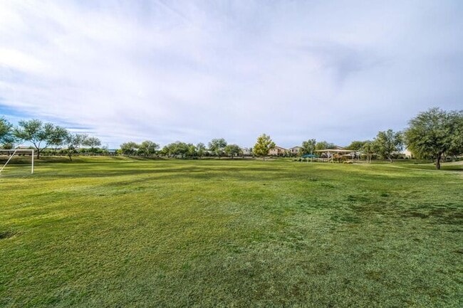 Building Photo - 4BR / 2.5BA Home with Expansive Lot – 2-Car Garage, Community Pools & Golf