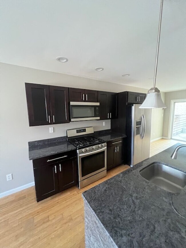 Building Photo - Stunning 3BD / 3BA Home with Rooftop Deck & Private Backyard — Ready to Call Home!