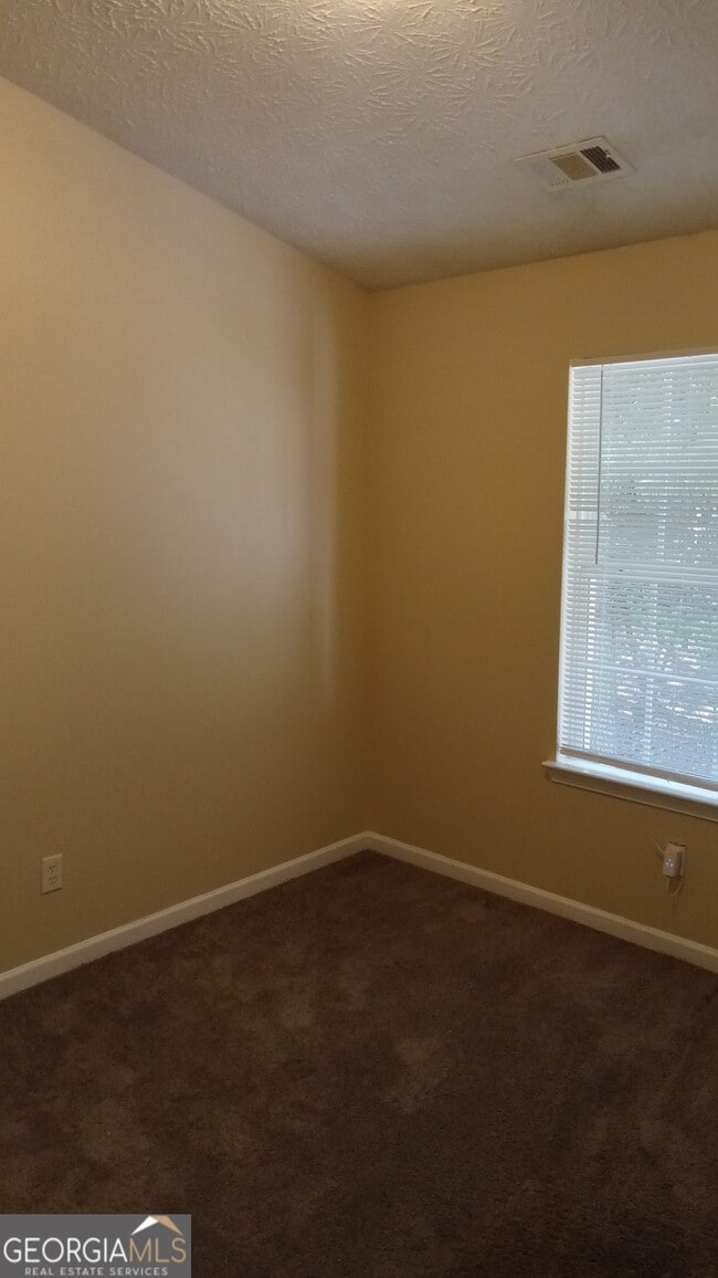 Building Photo - 6075 Camden Forrest Dr