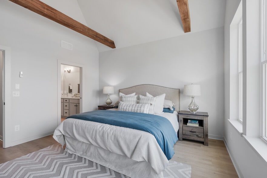 Soaring ceilings, natural textures, and refined light create a space that invites restoration. - 358 E Village Ln