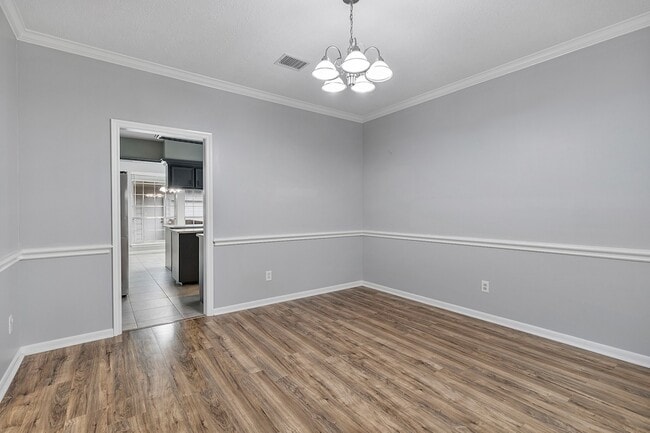 Building Photo - 5622 Woodland Creek Dr