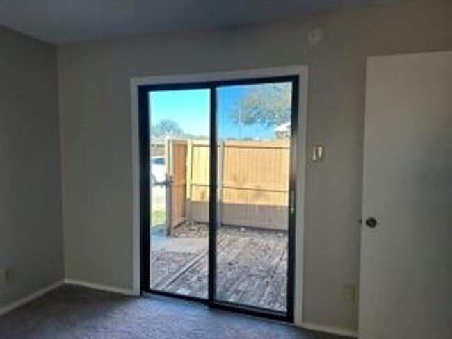 Building Photo - First-Floor 2BR/2BA Condo in Plano with Fireplace + 2 Carports