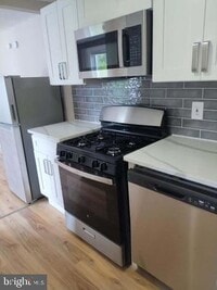 Building Photo - 100 E Holly