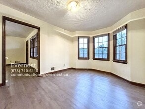 Building Photo - Charming 3-Bedroom Home with Deck and Gara...