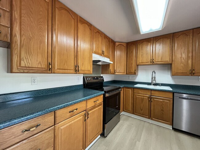 Building Photo - Charming Ranch Home with Sunroom or 4th Bedroom, Two-Car Garage and Fenced Backyard