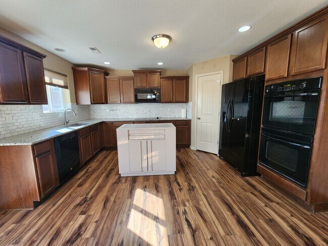 Building Photo - Stunning 4 Bed 3 Bath Home Near Peterson A...