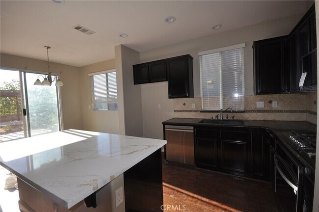 Building Photo - 8945 Honeysuckle Ave