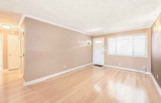 Building Photo - Spacious 2-Bedroom Condo with Forest Views, Private Balcony, In-Unit Laundry & Community Amenitie...