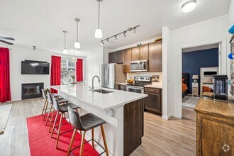 Building Photo - Spacious and Bright Modern 3-Bedroom Condo...