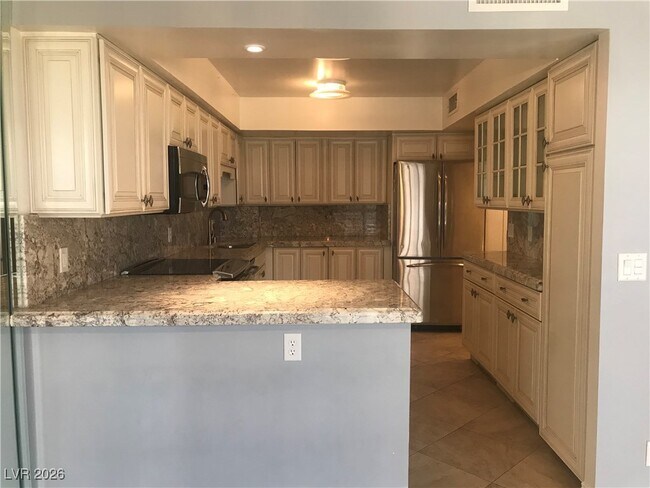 Building Photo - 205 E Harmon Ave