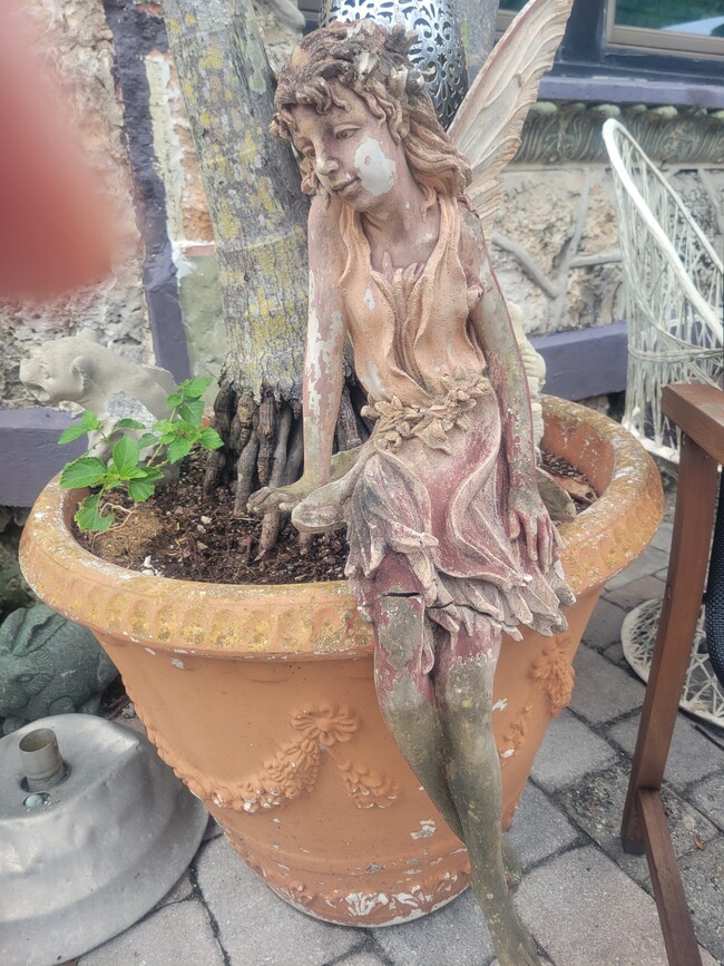 garden statue - 3600 N Bay Homes Dr