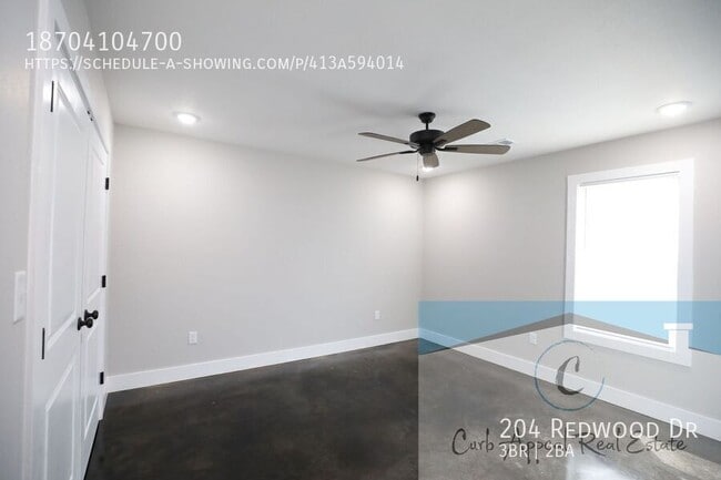 Building Photo - 204 Redwood Dr