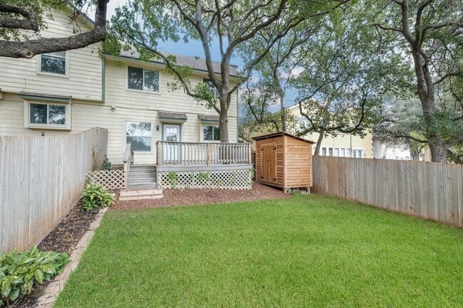 Building Photo - ***APPLICATION CURRENTLY UNDER REVIEW***Modern Elegance: 3-Bedroom Townhome with Wood Flooring, S...