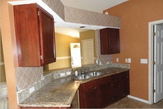 Building Photo - 3-Bedroom, 2-Bathroom single-family home brick construction