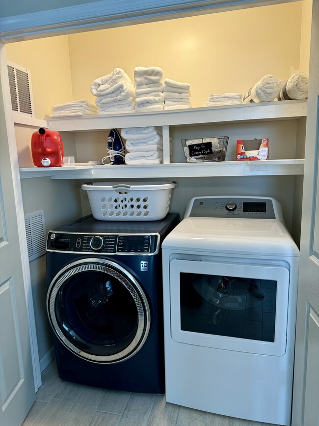 Laundry area off kitchen. - 189 Newton St