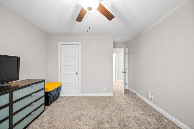 Building Photo - Stocked Pond, Walking Trails and More!!