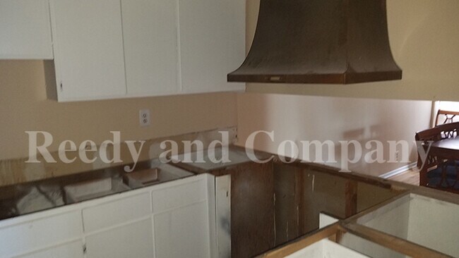 Building Photo - 6588 Poplar Woods Cir S