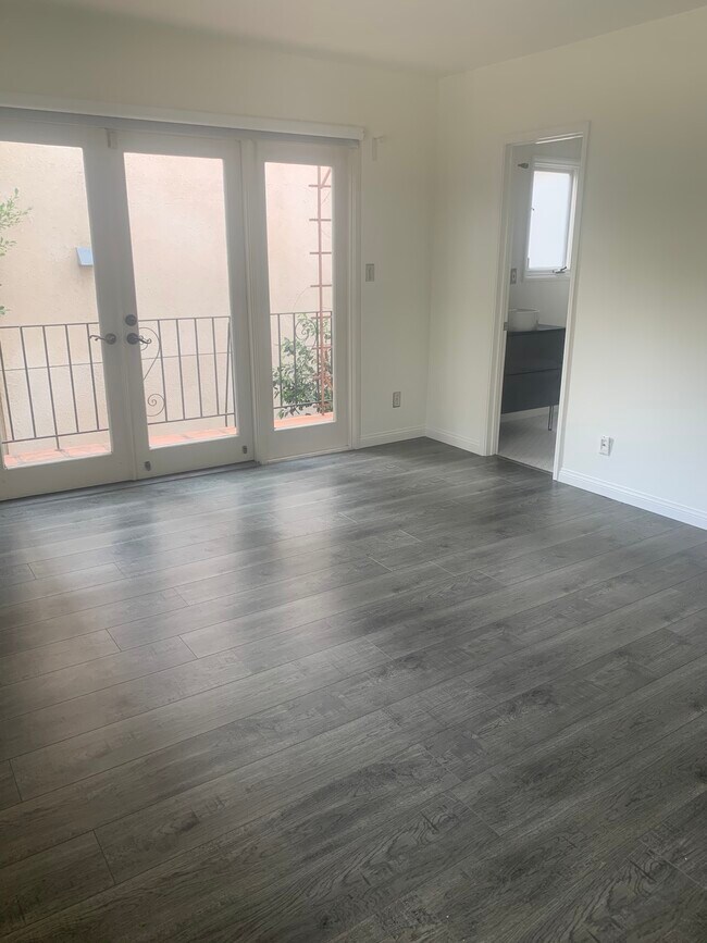 Master Bedroom Facing Full Bathroom and Private Patio - 1314 16th St