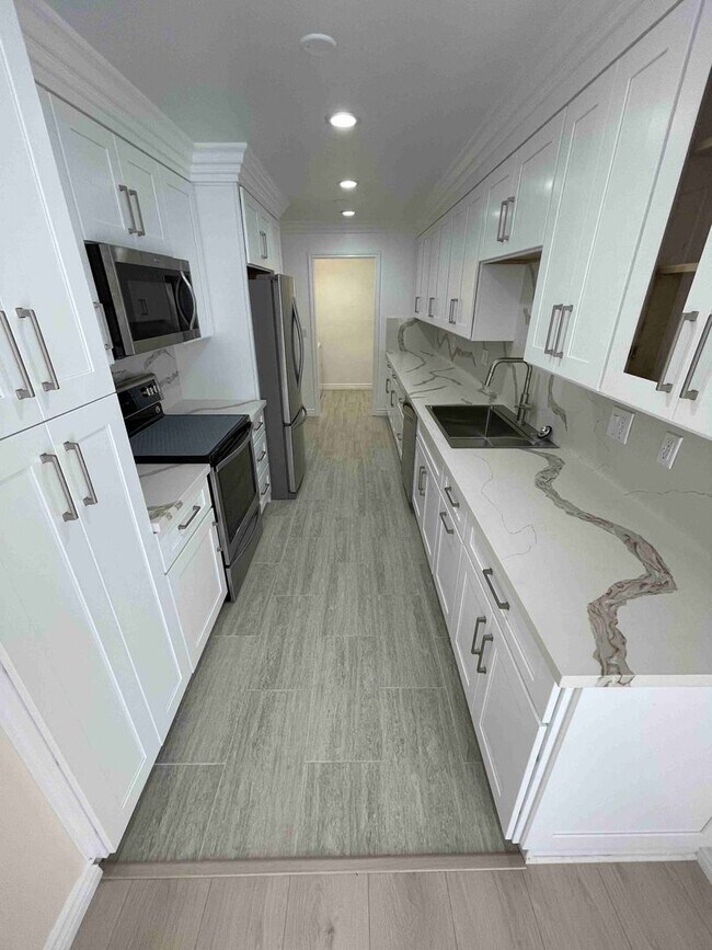 Building Photo - COMPLETELY UPDATED AND REMODELED ENCINO SP...
