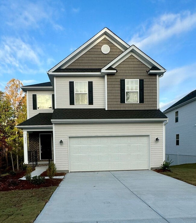 Building Photo - 4BR/2.5BA in Steel Creek's Brightwater Neighborhood