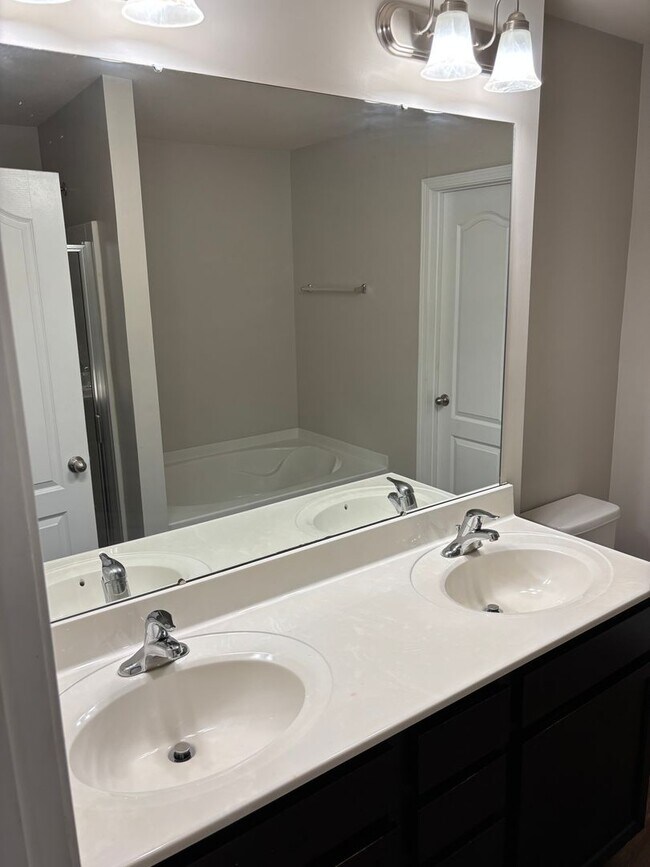 Building Photo - Four Bedroom Home In Mineral Springs/Unive...