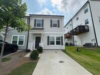 Building Photo - Corner townhome with three bedrooms 2 1/2 ...
