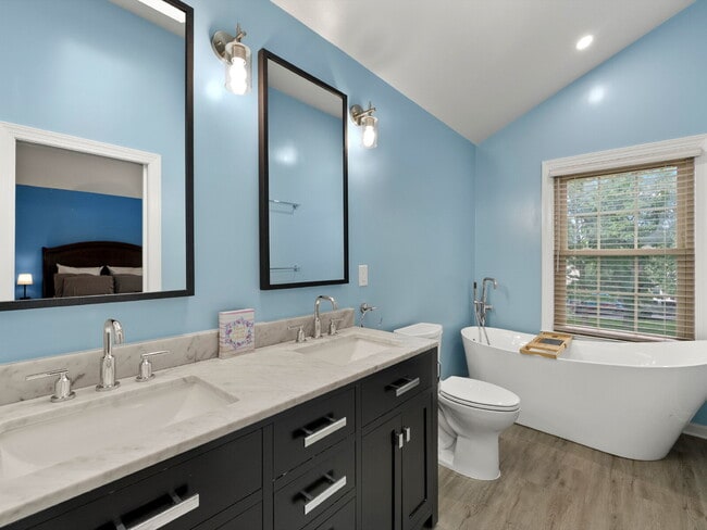 Building Photo - "Stunning 4-Bed Gem with Finished Basement...