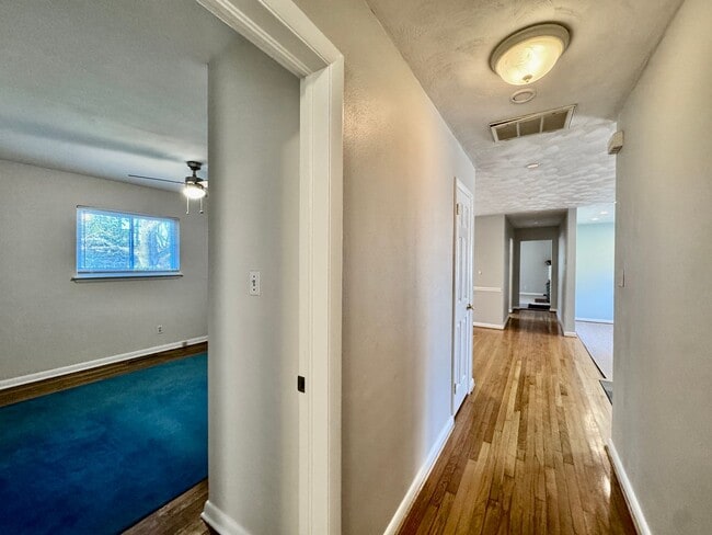 Building Photo - Available NOW! Lakefront 4 Bedroom/2 Bath Home, Pet-Friendly, Fenced Yard, Great School Zones!