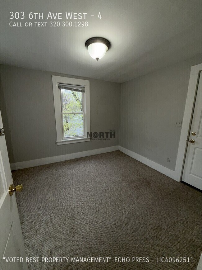 Building Photo - 303 6th Ave W