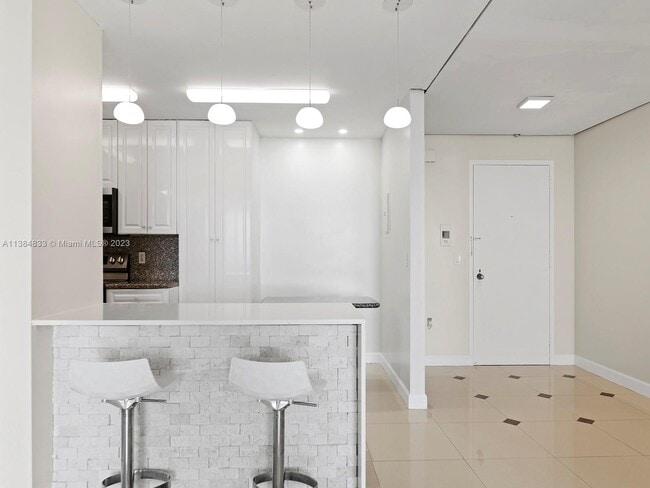 Building Photo - 9801 Collins Ave