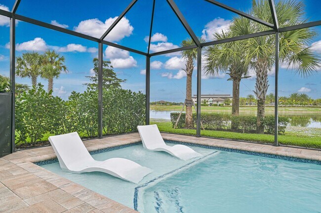 Building Photo - ** Single Family Home ~ Verdana Village ~ 3 Car Garage ~ Salt Water Pool & Lake Views **