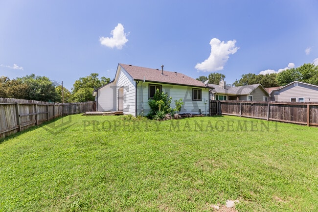 Building Photo - 6534 E 39th Ct N