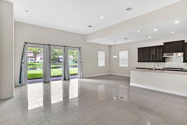 Building Photo - $3,995 Modern 4 Bedroom 3 Bath Gated House in Nocatee. Bonus Office. Amenities. Loft. Pet Friendl...