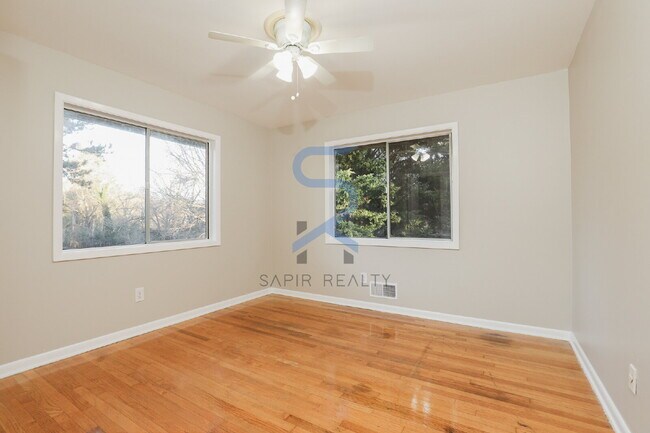 Building Photo - Move in before February 28th and choose your reward: a $250 Amazon Gift Card or a 55" Smart TV!