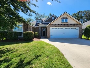 Building Photo - Spacious 4-Bedroom Home with Fenced Yard N...