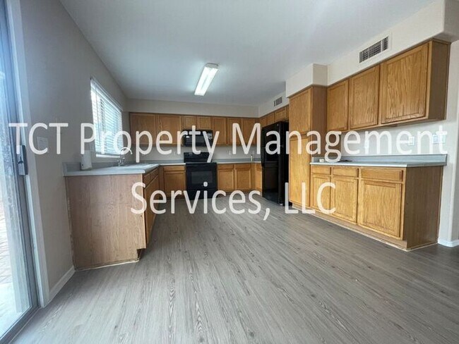 Building Photo - Updated Home with Downstairs Bedroom