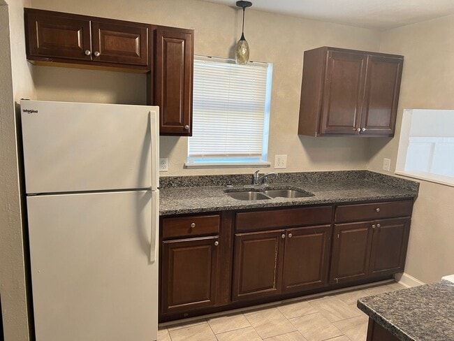 Building Photo - Available Now! Two-bedroom Duplex in Socas...