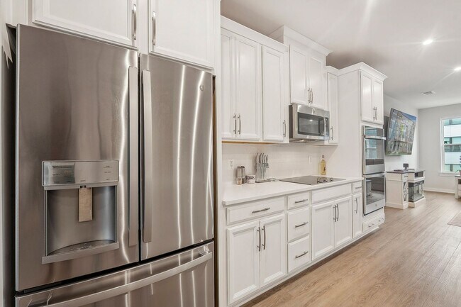 Building Photo - The Julianne is modern, functional, and full of charm—don’t let it get away!