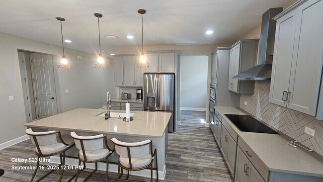 Building Photo - Beautifully Furnished Home in Upscale Gate...