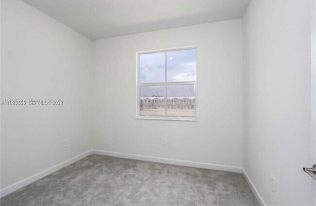 Building Photo - 26459 SW 148th Ave