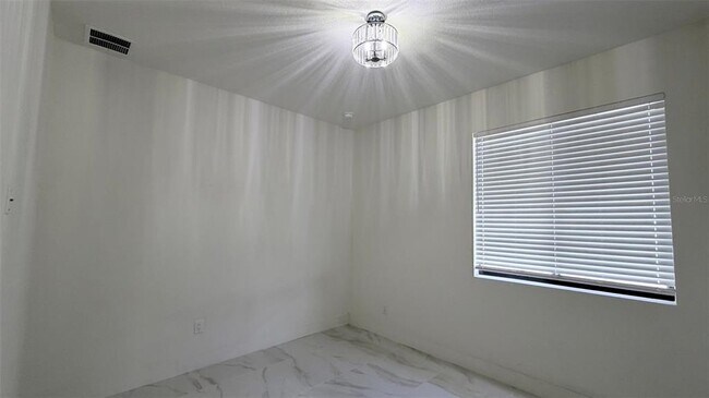 Building Photo - 4106 N Thatcher Ave