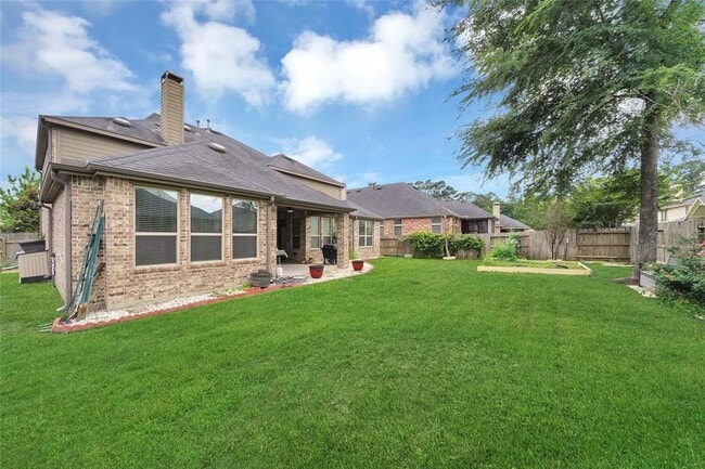 Building Photo - 8115 Spreadwing St