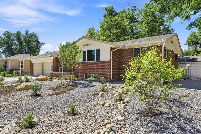 Building Photo - PRICE REDUCED!!  BEST PRICE IN THE AREA FOR 4+BEDROOM  Spacious 4-Bedroom Wheat Ridge Home with F...