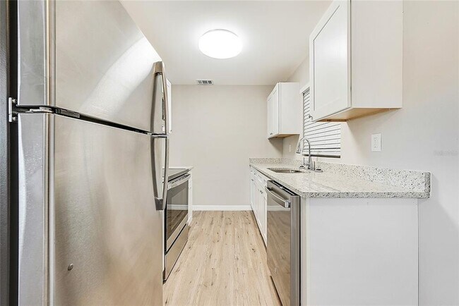 Building Photo - 5027 Kempston Dr