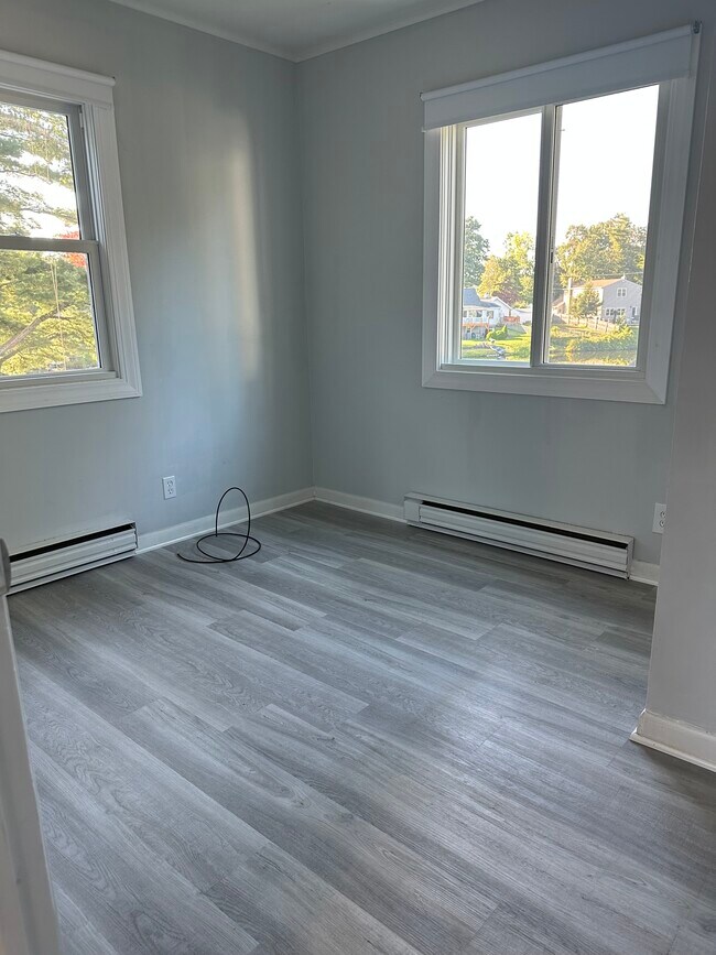 Bedroom #2 with 2 window views of the lake as well. - 16 Crescent Beach Dr