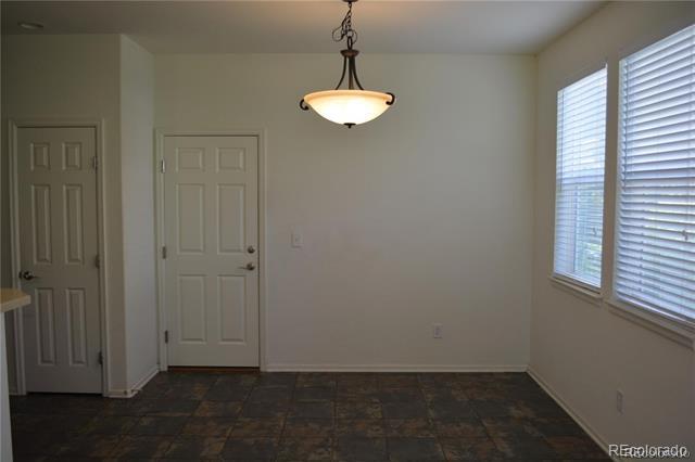 Building Photo - 8388 E 23rd Ave