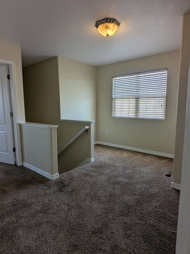 Building Photo - Beautiful 2 Story Townhome with 3 Car Garage!