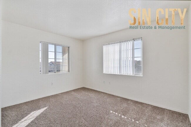 Building Photo - "Spacious 3-Bedroom Condo Oasis with 2 Baths in Vibrant Las Vegas!"