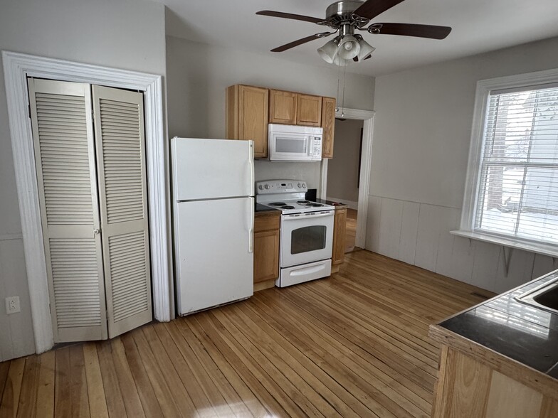 Kitchen showing pantry, refrig and stove - 34 Elm St